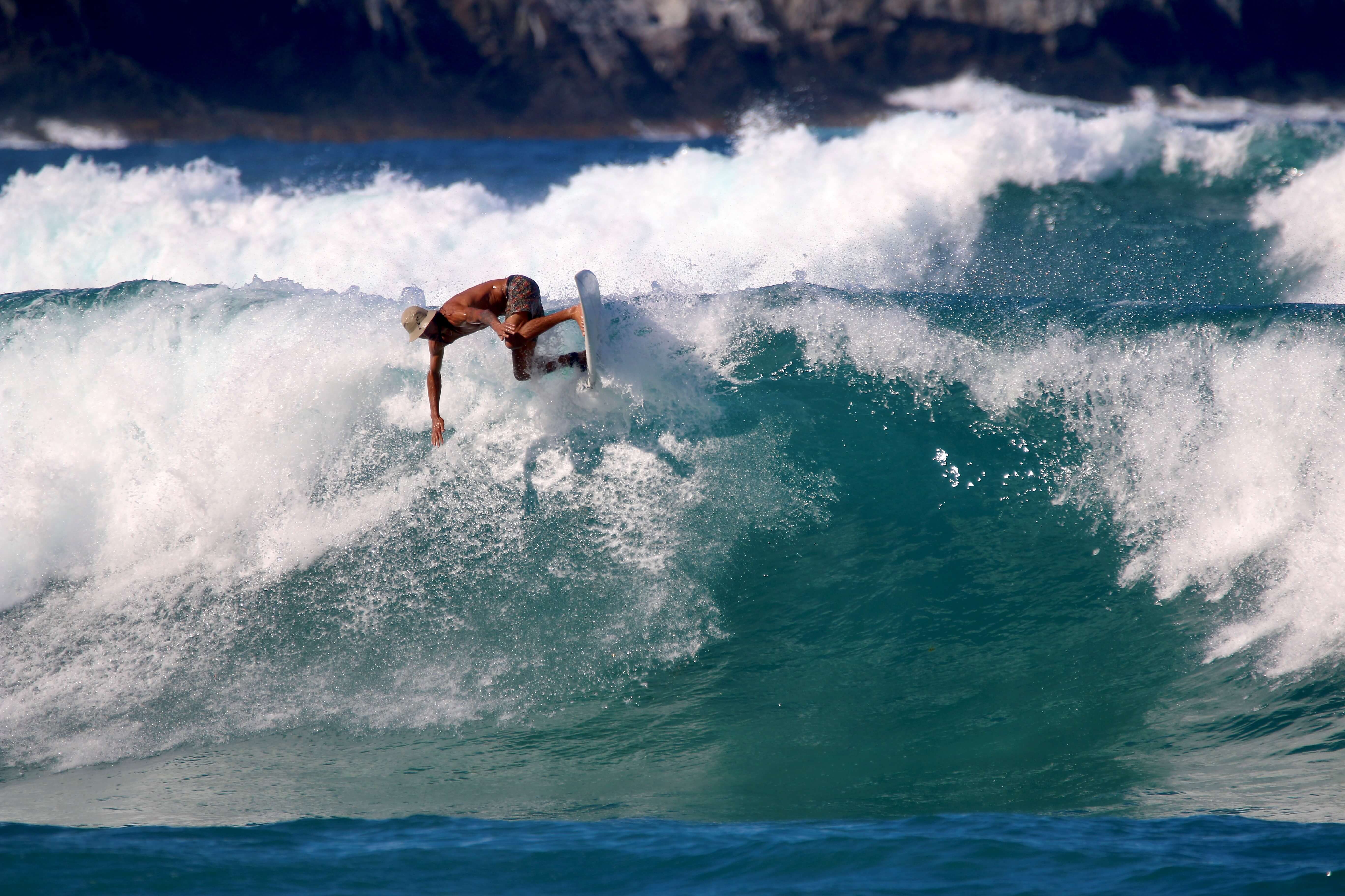 Man surfing a wave