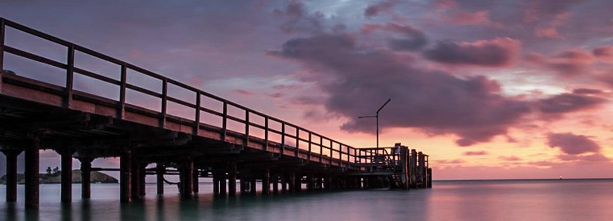 Lord Howe Island jetty with a sunset in the background